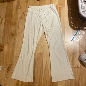 John Galt Brandy flared white sweatpants with drawstrings.